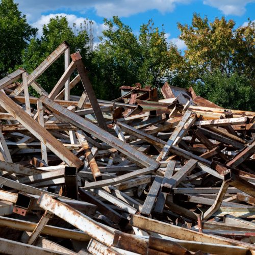 Scrap-metal formed after demolition of an old building ready for sale or recycle